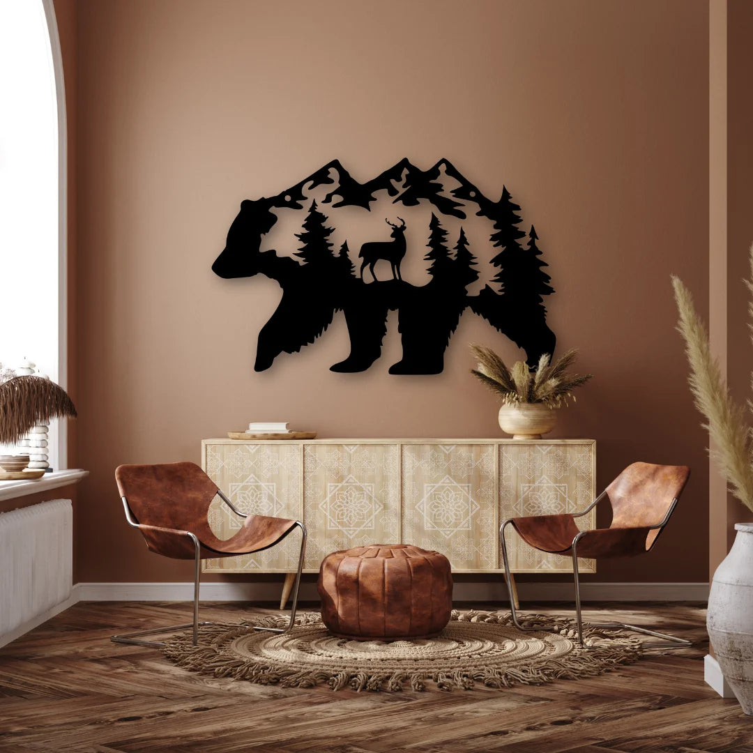 A dramatic black metal bear silhouette featuring trees and mountains brings rugged wilderness style to this warm-toned boho living area.