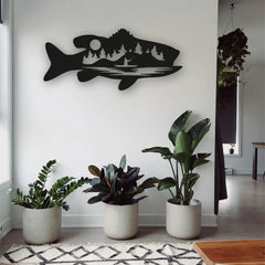 A unique fish wall decor piece featuring a forest and lake scene inside the silhouette of a fish, perfect for adding wilderness vibes indoors.