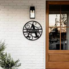 A round house monogram sign featuring the letter “A” and the name Alexander adds a personalized and elegant touch to any entrance or front porch wall.