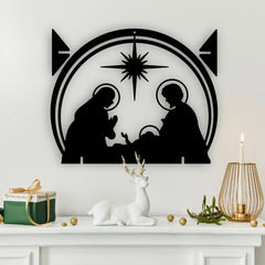 A graceful metal christmas sign showing the nativity scene hangs above a white mantel with gold and green holiday details, creating heartfelt merry christmas signs charm.