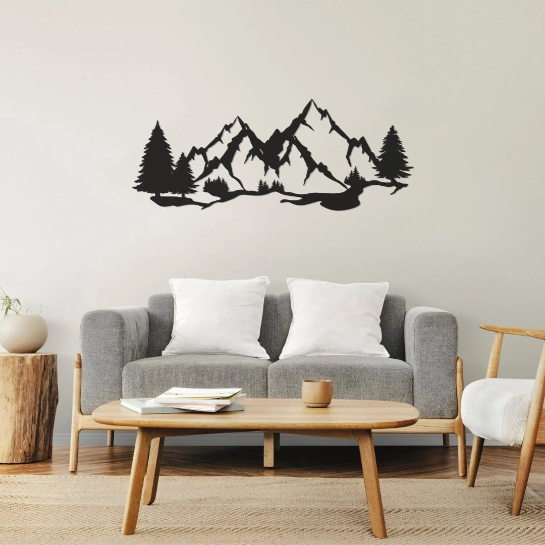 A scenic mountains artwork panel featuring layered peaks and trees enhances a light, minimal living room with wood accents and adds character as metal wall art decoration.