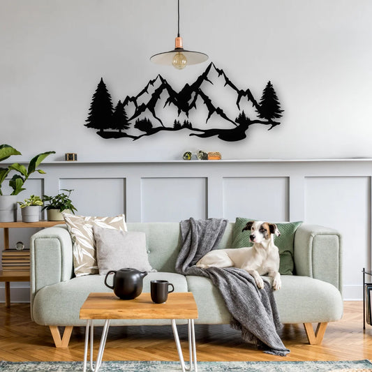 A dramatic mountain decor silhouette stretches above a modern living room couch, bringing the serenity of nature indoors with bold black lines.