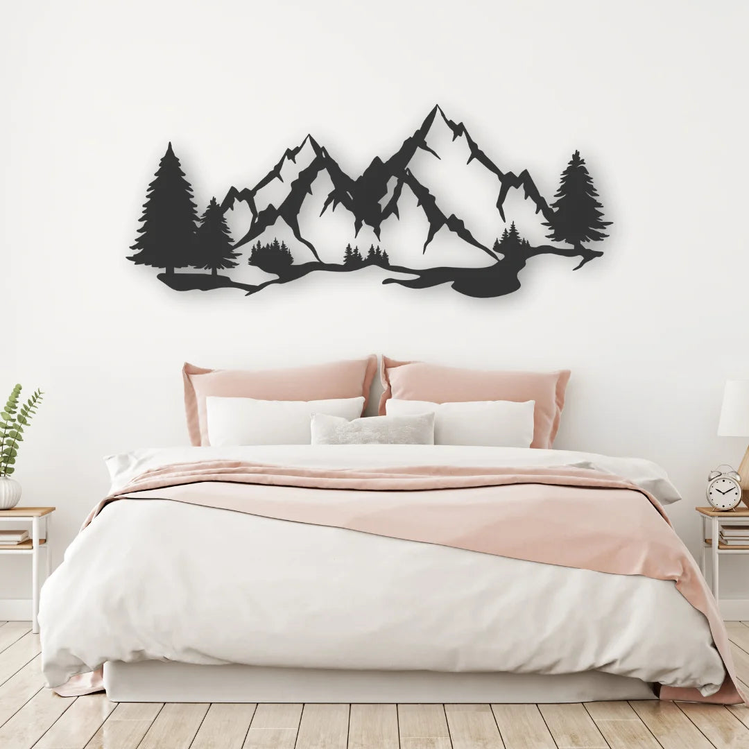 A minimal and elegant piece of mountain art displayed above a soft-toned bed, adding peaceful character to this modern bedroom.