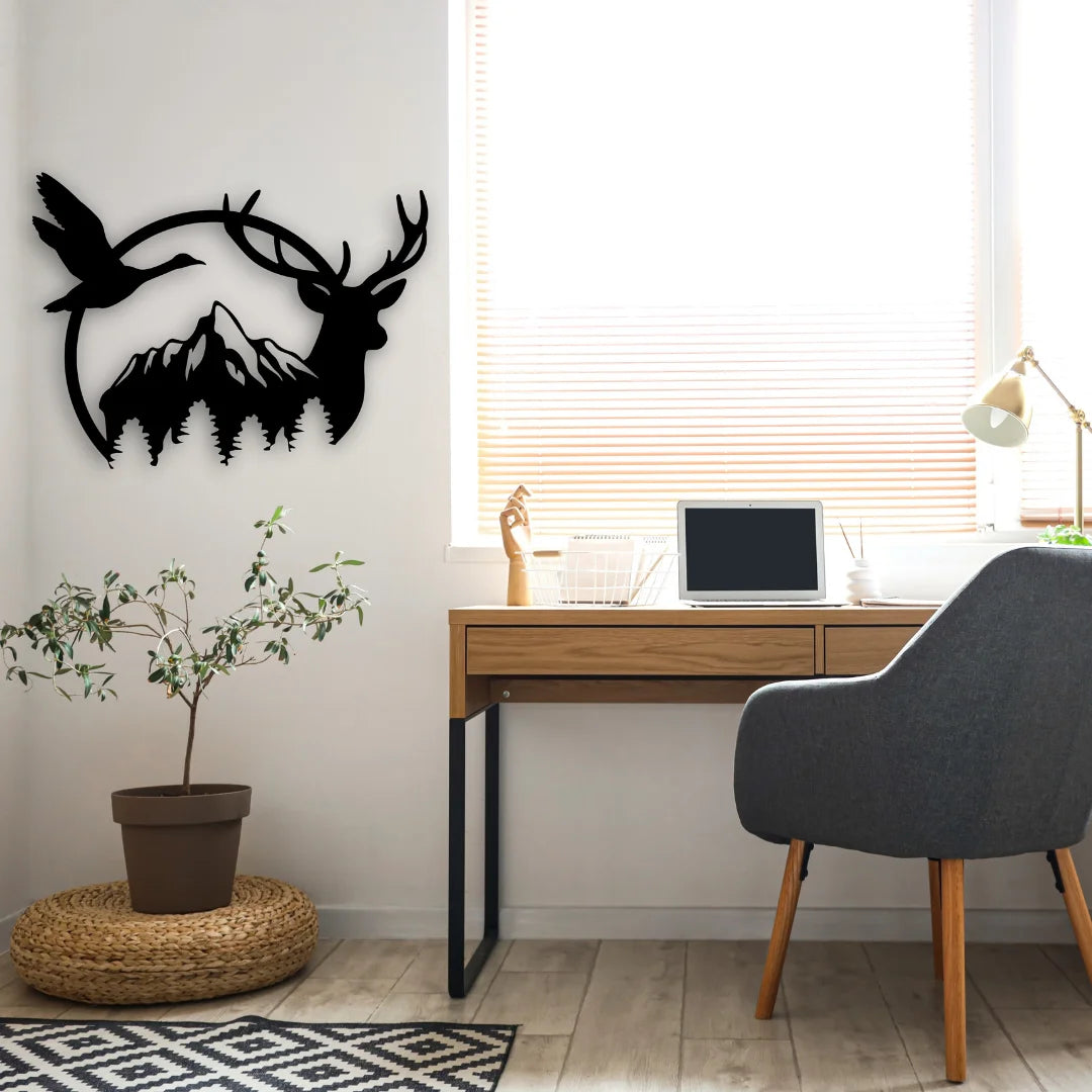 This woodland-inspired metal wall ornaments piece brings harmony and wild elegance to a cozy, plant-filled home office space.