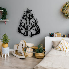 A creative christmas tree wall art crafted from antlers and stars spelling NOEL, making a festive and playful addition to a kid’s holiday space.