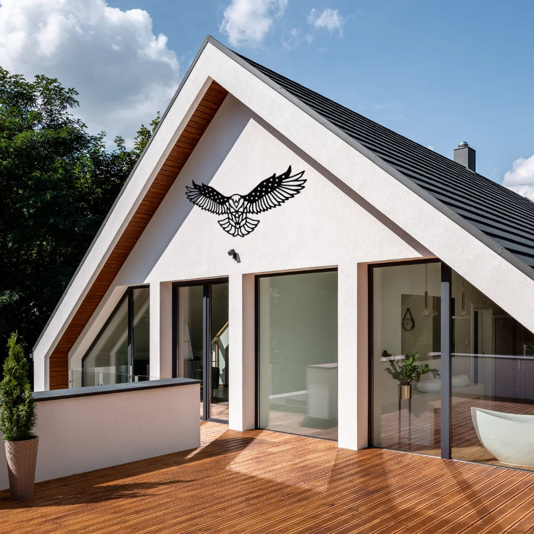 This bold eagle sign spreads its wings across the white exterior, adding a powerful symbol of freedom to modern architecture.