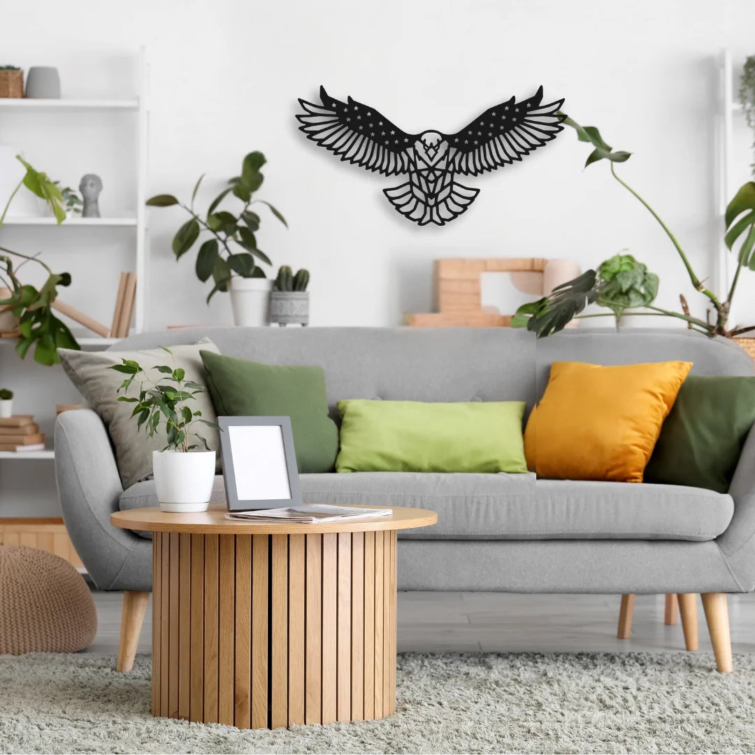 A powerful black metal eagle wall art decorates the wall, symbolizing freedom and strength in this nature-filled, lively living room.