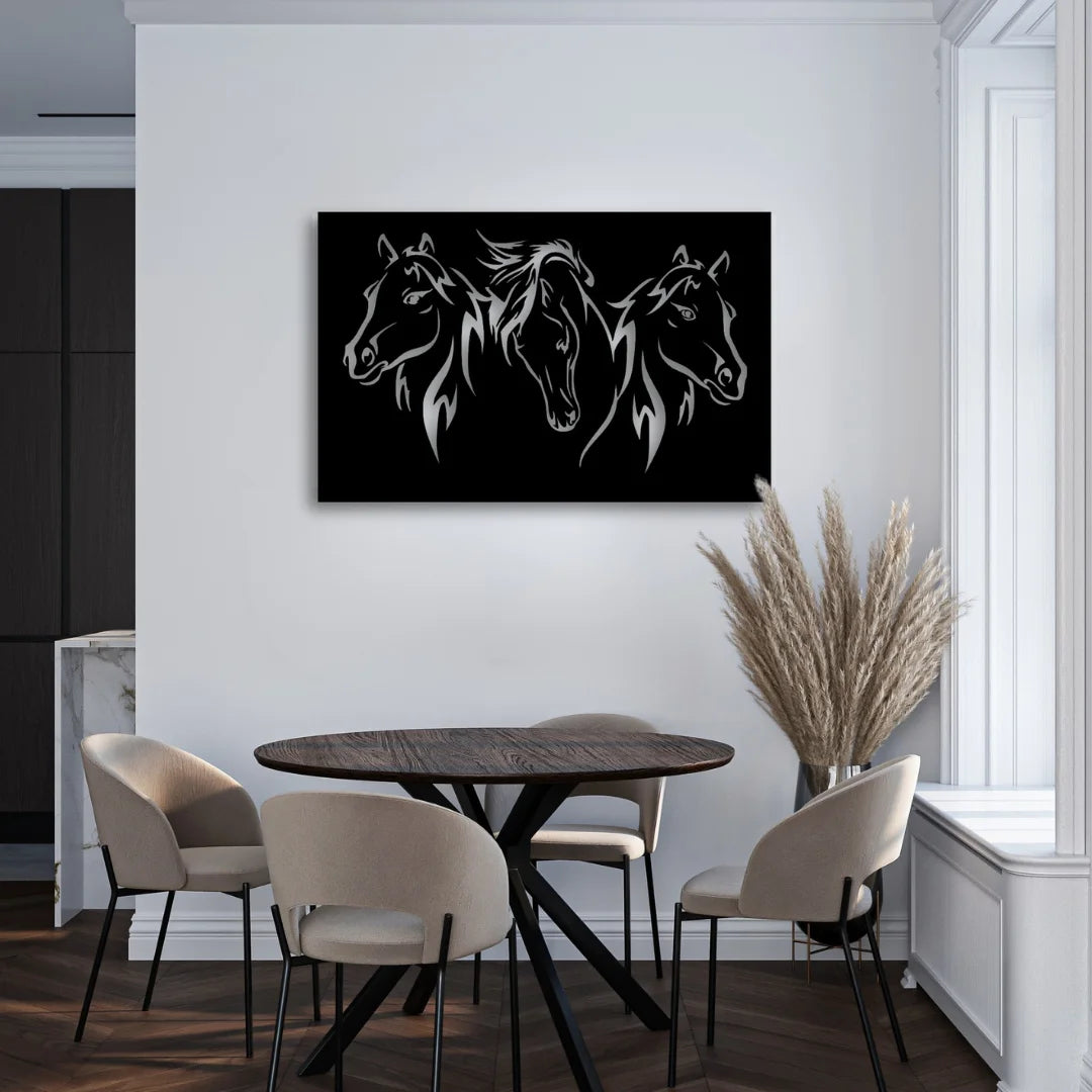 A dramatic wall piece with three horse heads in tribal linework brings bold metal wall sculpture energy to this space.