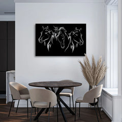 A dramatic wall piece with three horse heads in tribal linework brings bold metal wall sculpture energy to this space.