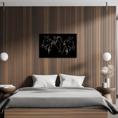 Three expressive horse heads in this metal wall art decor for living room piece add strength and elegance above a wood-accented bed.