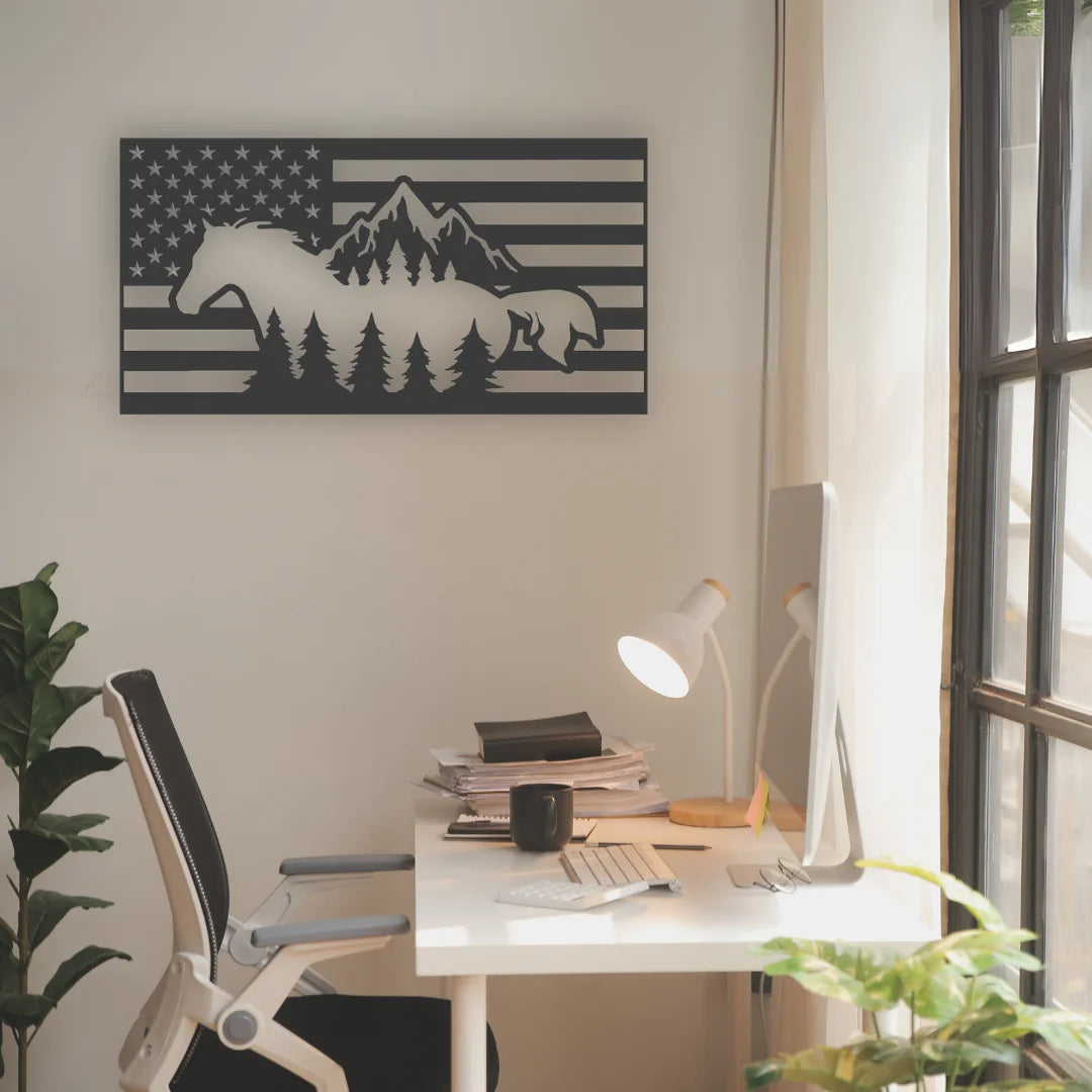 A patriotic metal sign custom showing wild horses and mountains against a U.S. flag backdrop, ideal for decorating a western-themed workspace.
