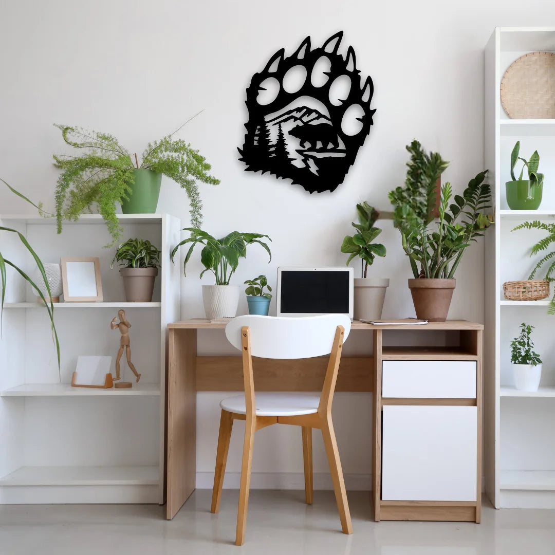 This modern metal art for walls features a fierce bear paw design above a home office desk, blending wild themes with indoor tranquility.
