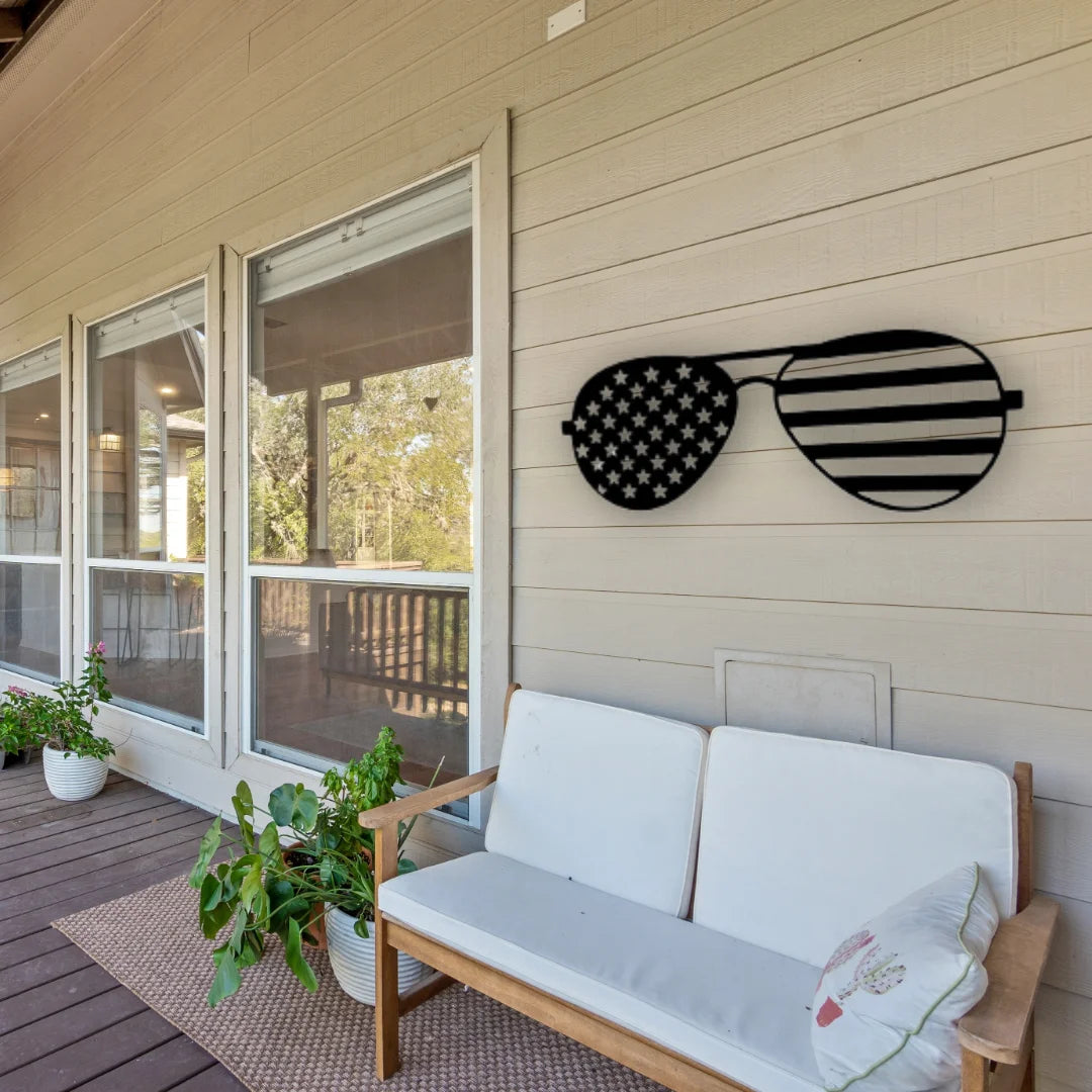 An eye-catching american flag rectangle design in the shape of sunglasses creates a bold patriotic statement on this porch wall.
