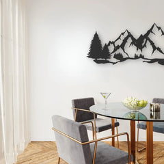Detailed metal wall art for living room featuring a forest landscape scene elevates this dining space with outdoorsy calm.
